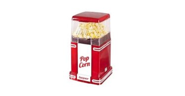 une petite machine à pop-corn rouge