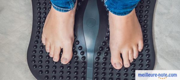 Un repose-pied qui fait des massages