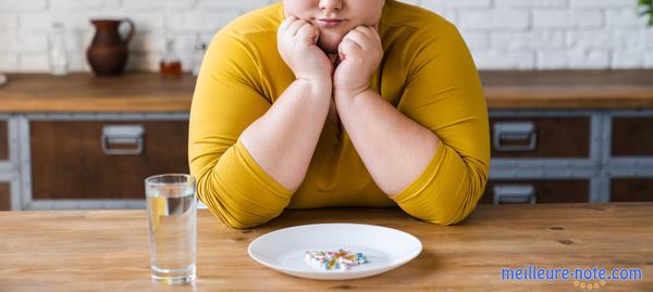 une femme obèse près de son bruleur